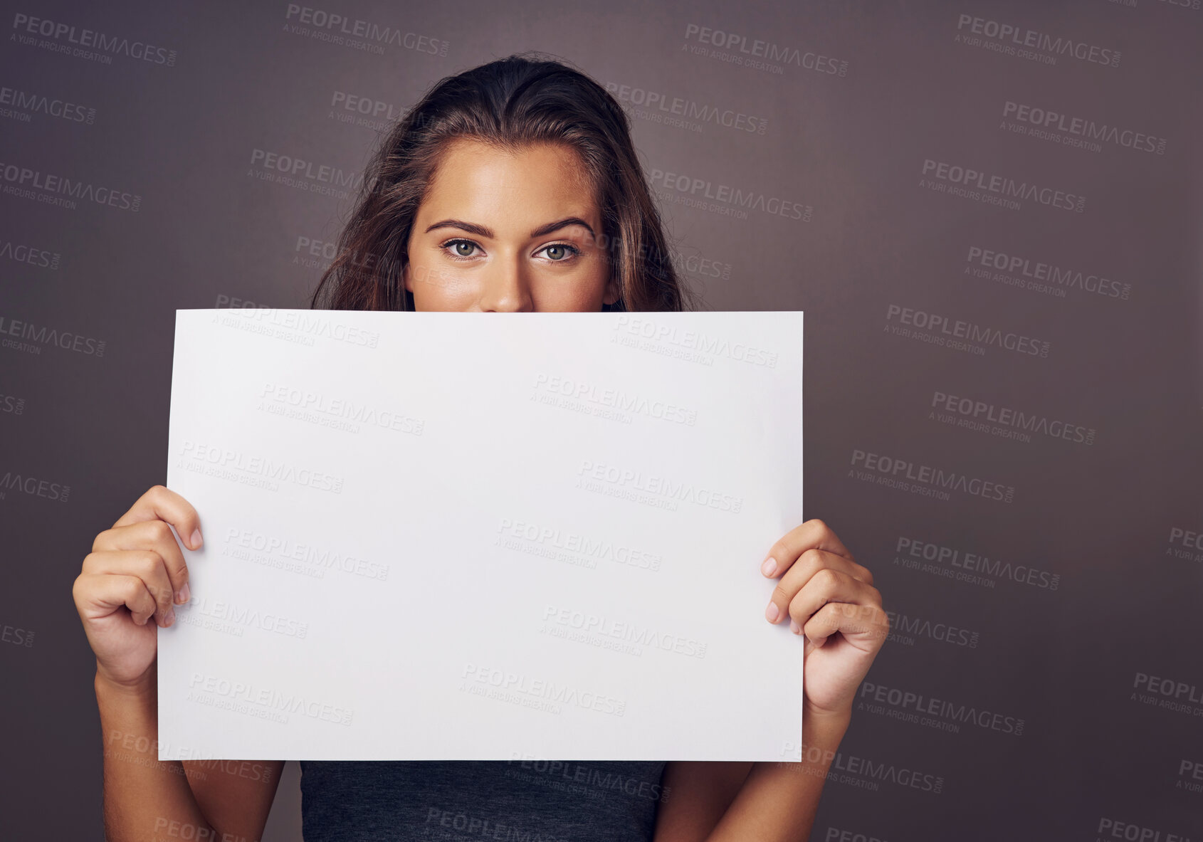 Buy stock photo Woman, portrait and studio background with board for mockup, idea for advertising or social media billboard. Female person, backdrop and empty poster for information, news notification or promotion