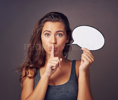 Buy stock photo Speech bubble, secret and portrait of woman in studio for whisper, gossip and finger on lips. Mockup space, social media and person with poster for information, announcement and emoji on background