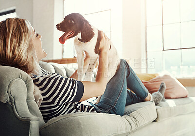 Buy stock photo Friends, love or pet with woman and dog on sofa in living room of home for bonding or cuddle. Relax, support or wellness and owner playing with puppy in apartment for attention, companion or loyalty