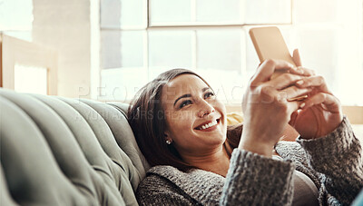 Buy stock photo Phone, search and happy woman relax on a sofa with social media, streaming or reading subscription sign up info at home. Smartphone, app and person in a living room with online dating, chat or scroll