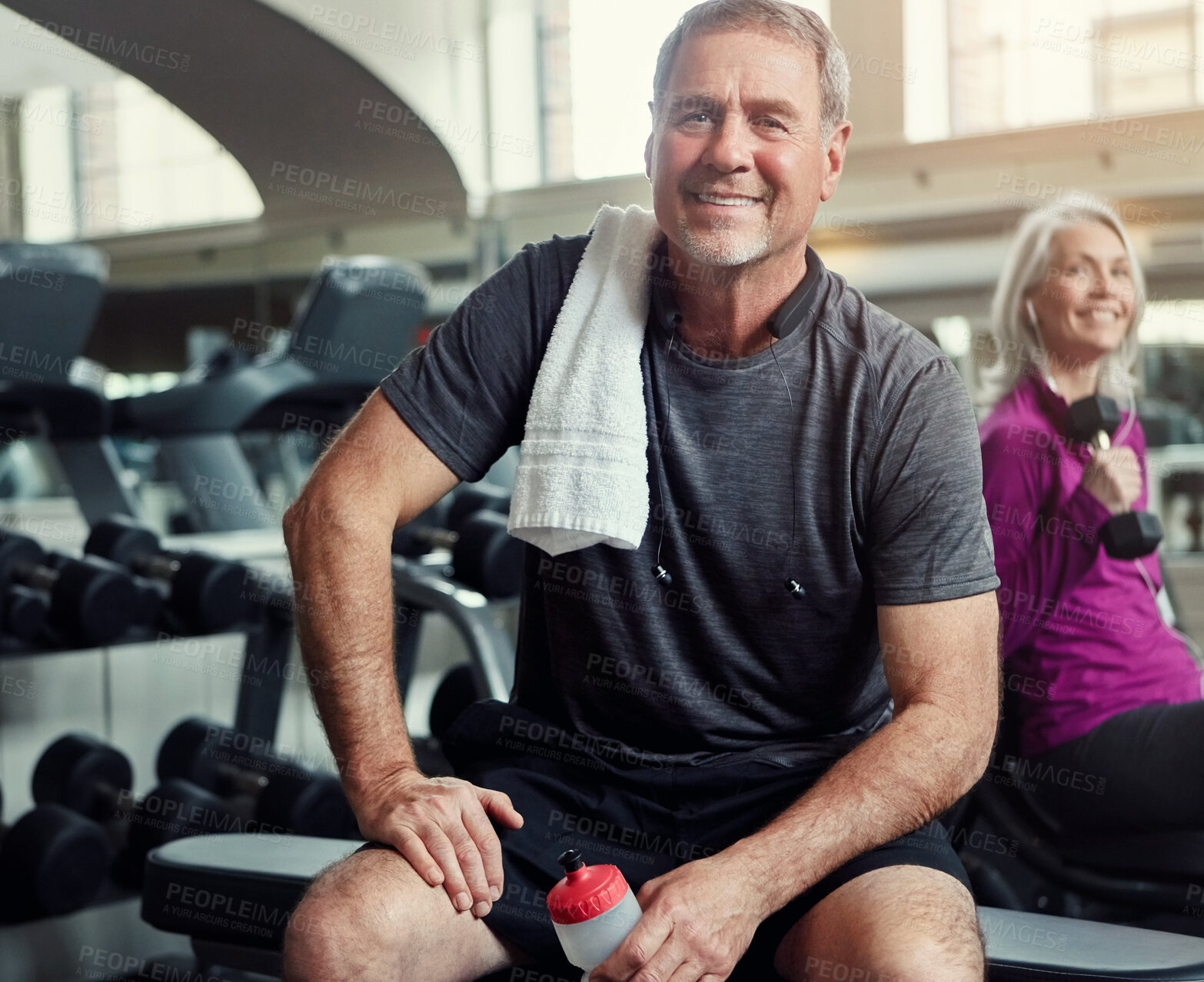 Buy stock photo Mature man, gym and water bottle in portrait on break with woman for fitness, training and weightlifting. Senior people, couple and happy with exercise for wellness, health and workout in retirement