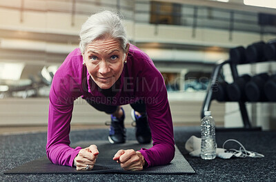 Buy stock photo Mature woman, plank and gym on floor with balance for strong core muscle with vision for wellness. Person, training and workout for abdomen, stomach and challenge for development at fitness club