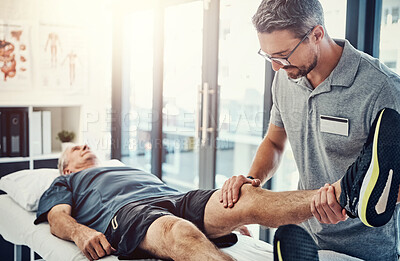 Buy stock photo Physiotherapy, senior man and stretching leg for knee injury, medical and consultant with healthcare. Consultation, chiropractor and physical therapy with rehabilitation and care in doctor office