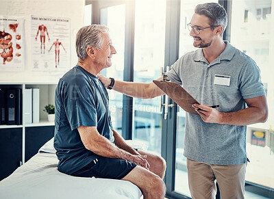 Buy stock photo Physiotherapy, clipboard and mature man consulting chiropractor at clinic for body, assessment and examination. Physical therapy, service and client with expert for insurance, checklist or compliance