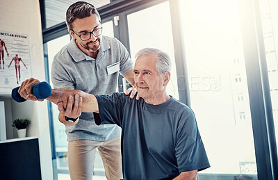 Buy stock photo Senior man, physiotherapist and dumbbell with help for progress, recovery and balance for wellness. People, healthcare and rehabilitation from injury with support, care and strong muscle at clinic