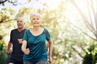 Buy stock photo Running, outdoor and old couple with sunshine, smile and wellness with challenge, healthy and hobby. Park, senior man and mature woman with training, retirement and exercise with fitness and cardio