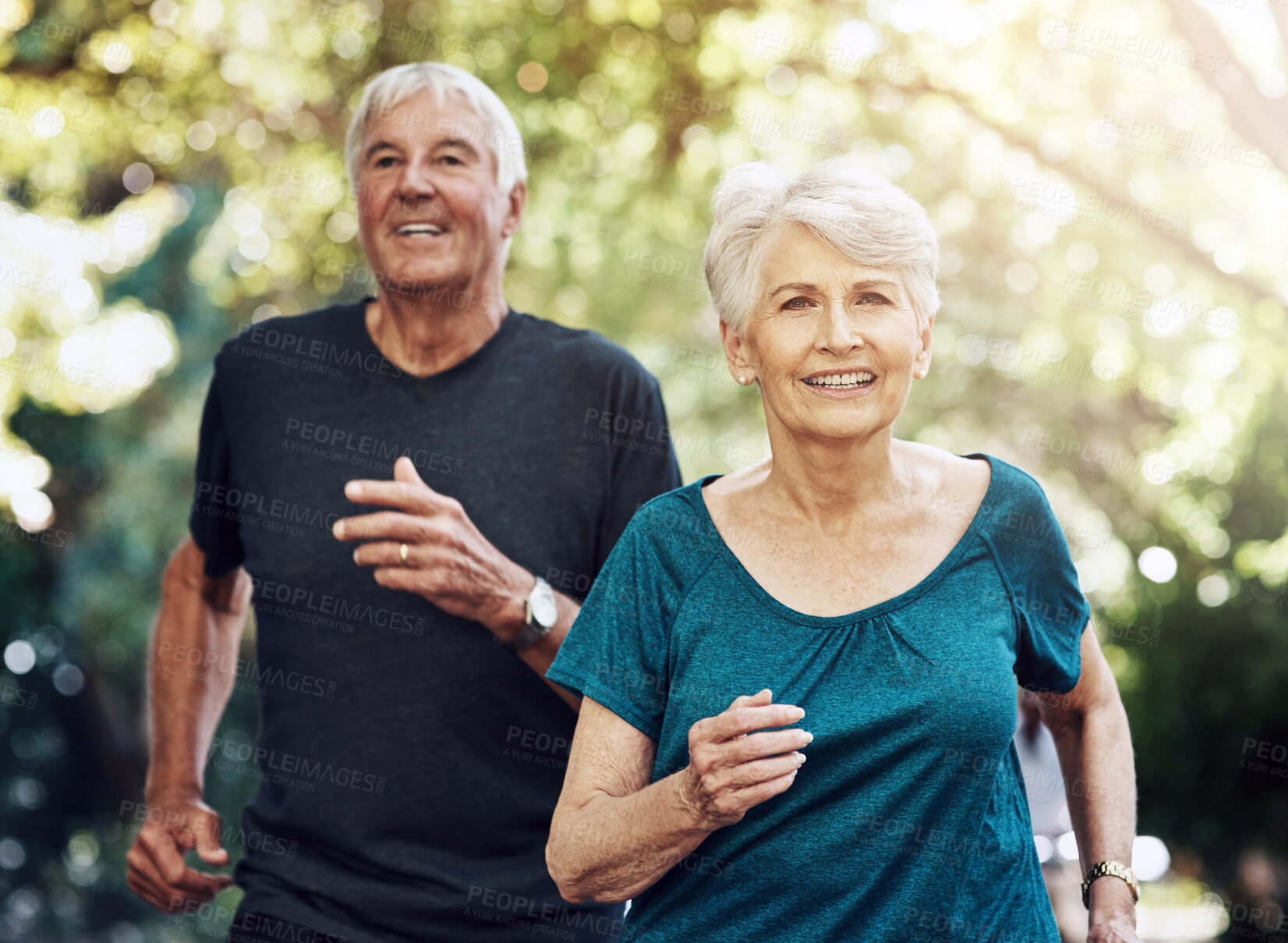 Buy stock photo Running, outdoor and old couple with wellness, exercise and challenge with retirement, healthy and fitness. People in park, senior man or woman with balance, retirement or cardio with sunshine