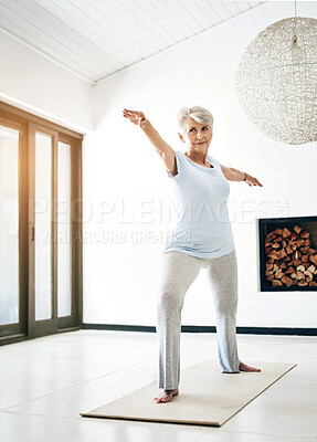 Buy stock photo Senior woman, home and yoga with warrior pose for mindset, balance and harmony in retirement. Female person, house or pilates with standing zen for wellness, calm exercise with body chakra for health