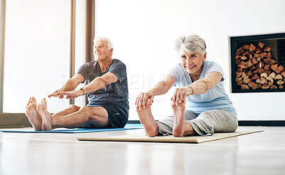 Buy stock photo Legs, stretching and senior couple with yoga, exercise and pilates for flexibility in home. Floor, mat and elderly people in retirement with energy balance, fitness or wellness with healthy lifestyle