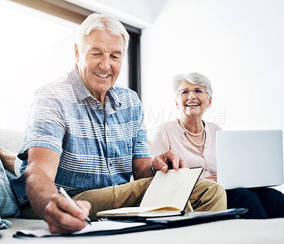 Buy stock photo Laptop, notebook and senior couple in home planning for retirement fund, savings and pension. Smile, computer and elderly man and woman writing budget notes for bills, mortgage and debt payment.