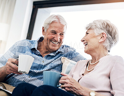 Buy stock photo Coffee, love and smile with senior couple in retirement home together for bonding or laughing. Funny, happy or relax with elderly man and woman in apartment for conversation, marriage or wellness