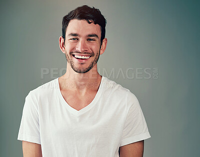 Buy stock photo Happy, man and portrait with confidence in studio for good mood, satisfaction and funny joke. Relax, male person and face with laughing for humor, comedy meme and confidence on gray background