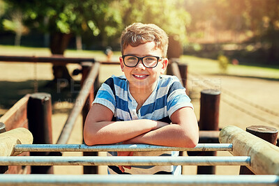 Buy stock photo Portrait, smile and boy on monkey bars play outdoors playground, climbing or games with exercise of motor development. Kid, adventure and fun on jungle gym park, balance or energy for physical growth