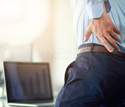 Buy stock photo Businessman, laptop and screen in office with back pain from overworked or burnout in corporate company. Chronic, strain and posture problem or stressed out with deadline, work and muscle issue.