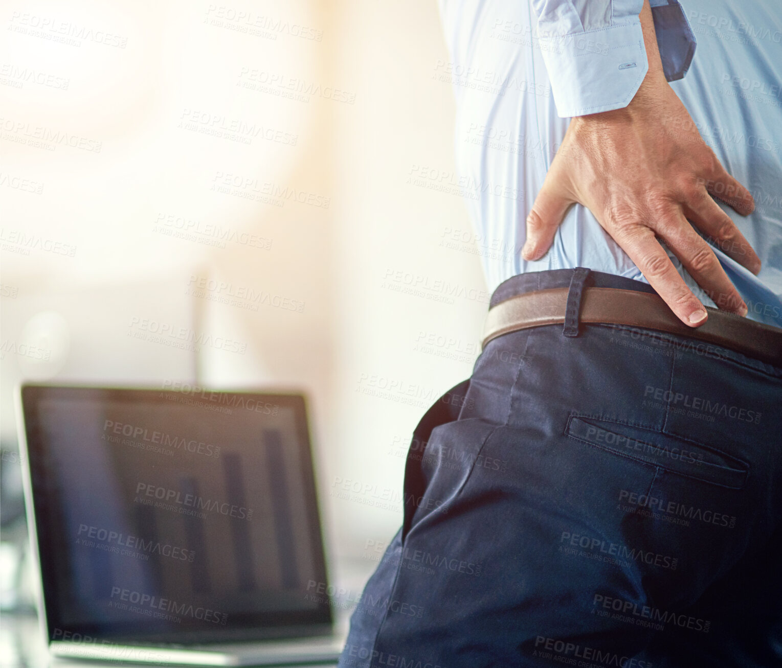 Buy stock photo Businessman, laptop and screen in office with back pain from overworked or burnout in corporate company. Chronic, strain and posture problem or stressed out with deadline, work and muscle issue.