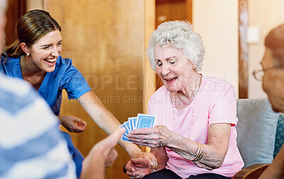 Buy stock photo Women, nurse and senior patient with playing cards for games, fun and happy at nursing home. People, caregiver and smile with bonding for care, support and trust in healthcare for entertainment