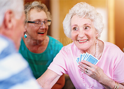 Buy stock photo Assisted living, senior woman and poker with friends playing cards in retirement home together. Community, competition or game with happy elderly people in apartment for bonding, fun or leisure