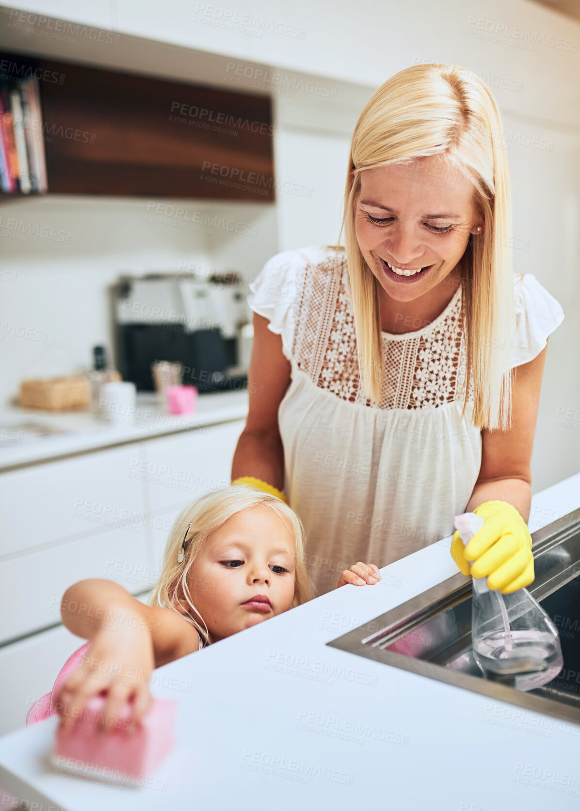 Buy stock photo Cleaning, hygiene and spray bottle with family in kitchen of home together for chores or housework. Bacteria, disinfectant or sponge with mother and daughter in apartment for sanitary health