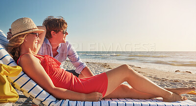 Buy stock photo Happy, couple and relax with chair at beach for travel, vacation and outdoor adventure together. Man, woman and smile with thinking by ocean for summer holiday, love and romantic honeymoon in Bali