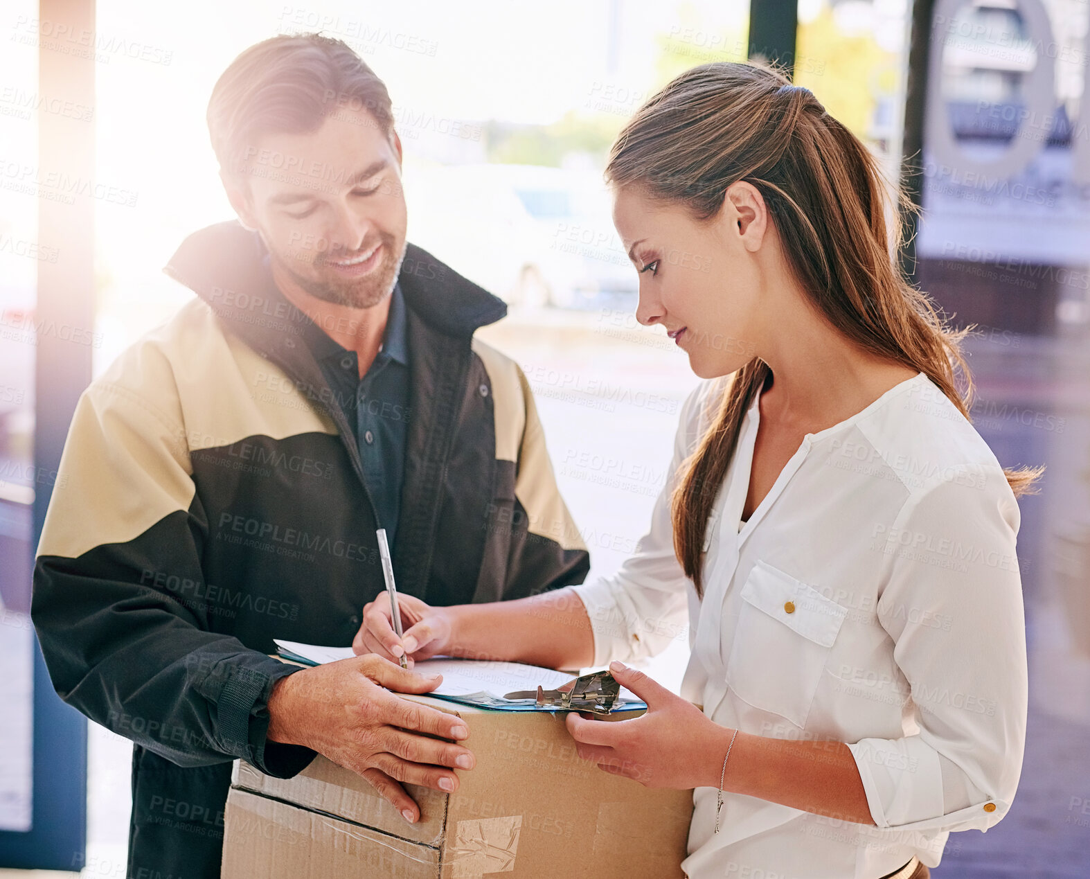 Buy stock photo Woman, package and signing delivery with courier for drop off with receipt for company with lens flare. Summer, business and parcel for customer in workplace with writing for order confirmation.