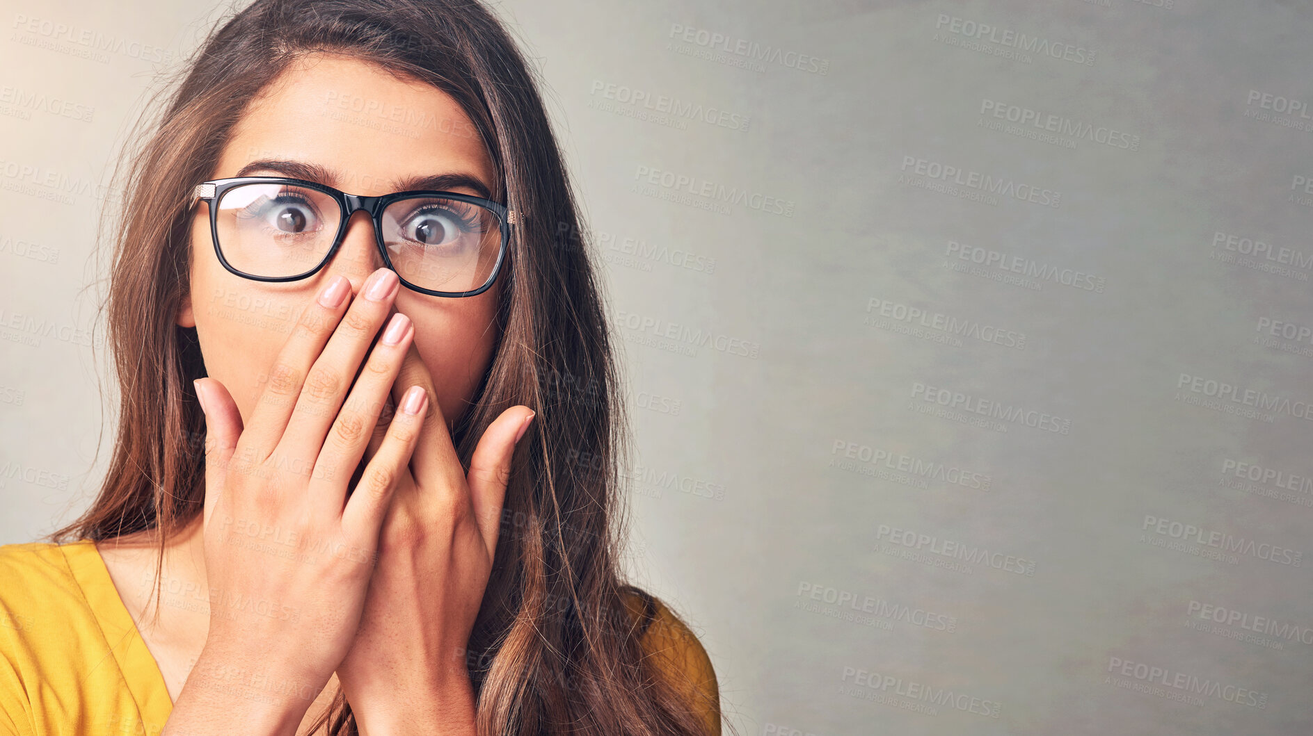 Buy stock photo Gossip space, shock or portrait of woman for announcement mockup in studio on grey background. Wow, fake news or scared female person with surprise, secret or omg reaction with hands to cover mouth