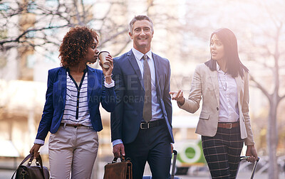 Buy stock photo Happy, business people and corporate travel for work trip, remote conference and walking in city. Smile, formal team and commute to seminar for diversity, journey and collaboration with lens flare