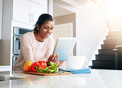 Buy stock photo Vegetables, ingredients and woman with tablet in kitchen for online, information and reading food recipe. Happy, person and ingredient with tech at home for meal prep, digital instructions or website