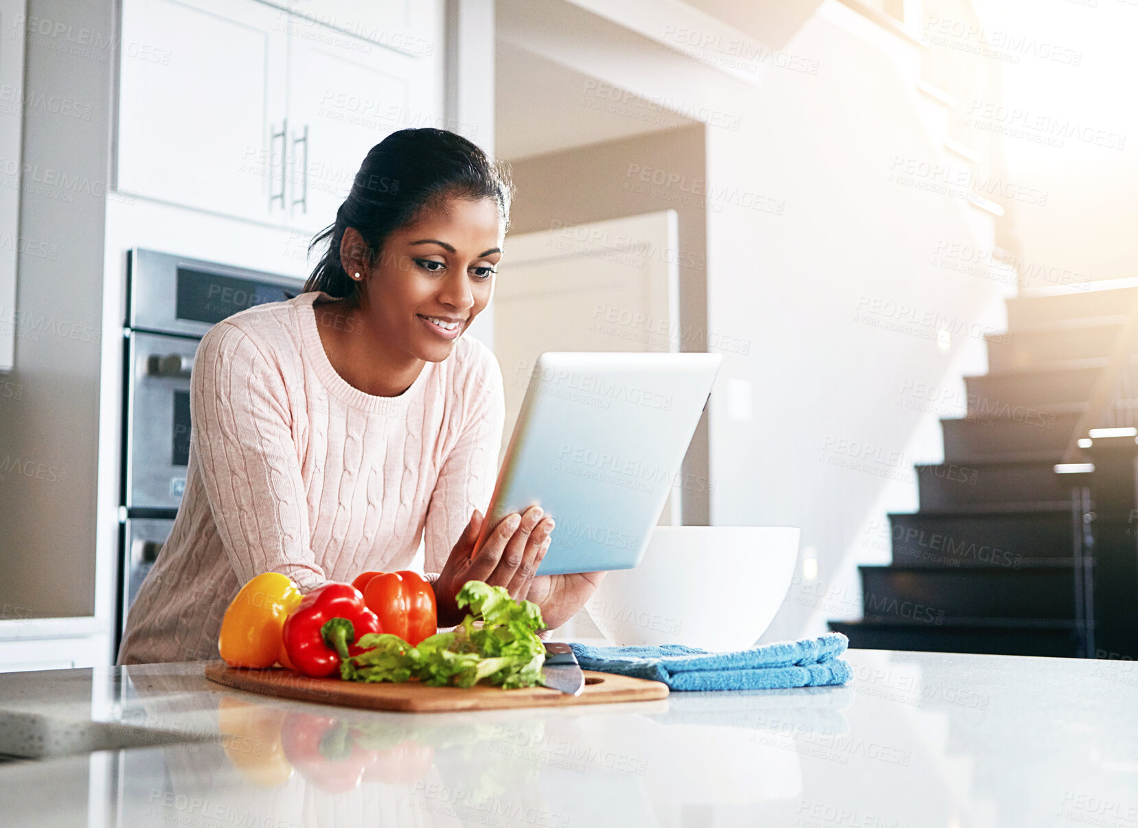 Buy stock photo Vegetables, ingredients and woman with tablet in kitchen for online, information and reading food recipe. Happy, person and ingredient with tech at home for meal prep, digital instructions or website