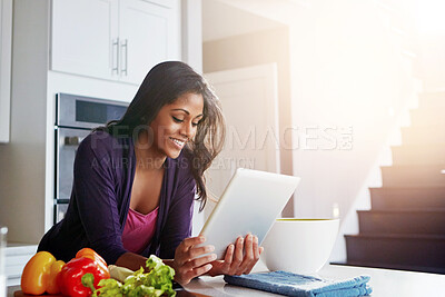 Buy stock photo Tablet, vegetables and woman in kitchen for cooking with health, wellness and diet recipe. Smile, ingredients and Indian female person with digital technology for nutrition meal instructions at home.