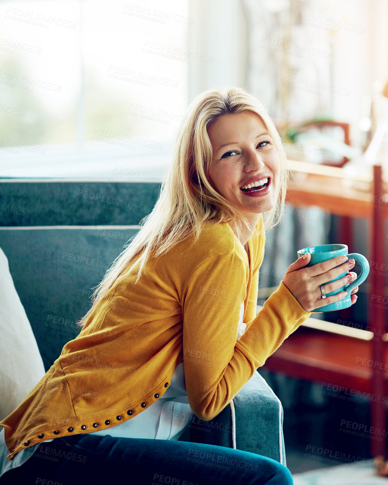 Buy stock photo Portrait, morning and couch for woman, coffee and smile in home, relax and warm in apartment and enjoy. House, tea and girl on sofa, rest and breakfast of drink, happy and calm for hot chocolate