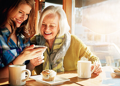 Buy stock photo Family, mother and daughter in cafe, cellphone and conversation with social media, coffee and digital app. People, mama and girl with smartphone, texting in restaurant and happiness with cappuccino