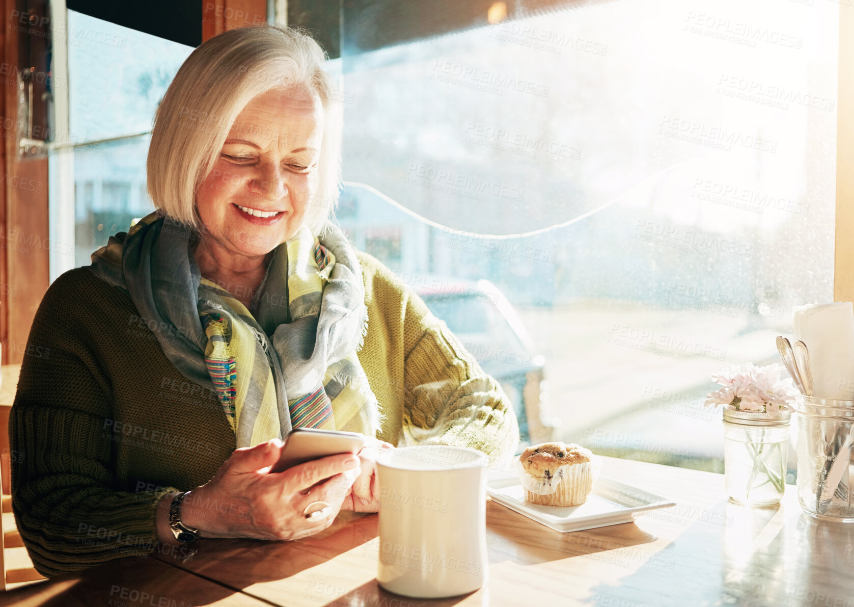 Buy stock photo Senior woman, smartphone and coffee in cafe for breakfast, app and digital menu with happiness in city. Elderly person, smile and tea in Sweden at restaurant with phone for email, chat and internet