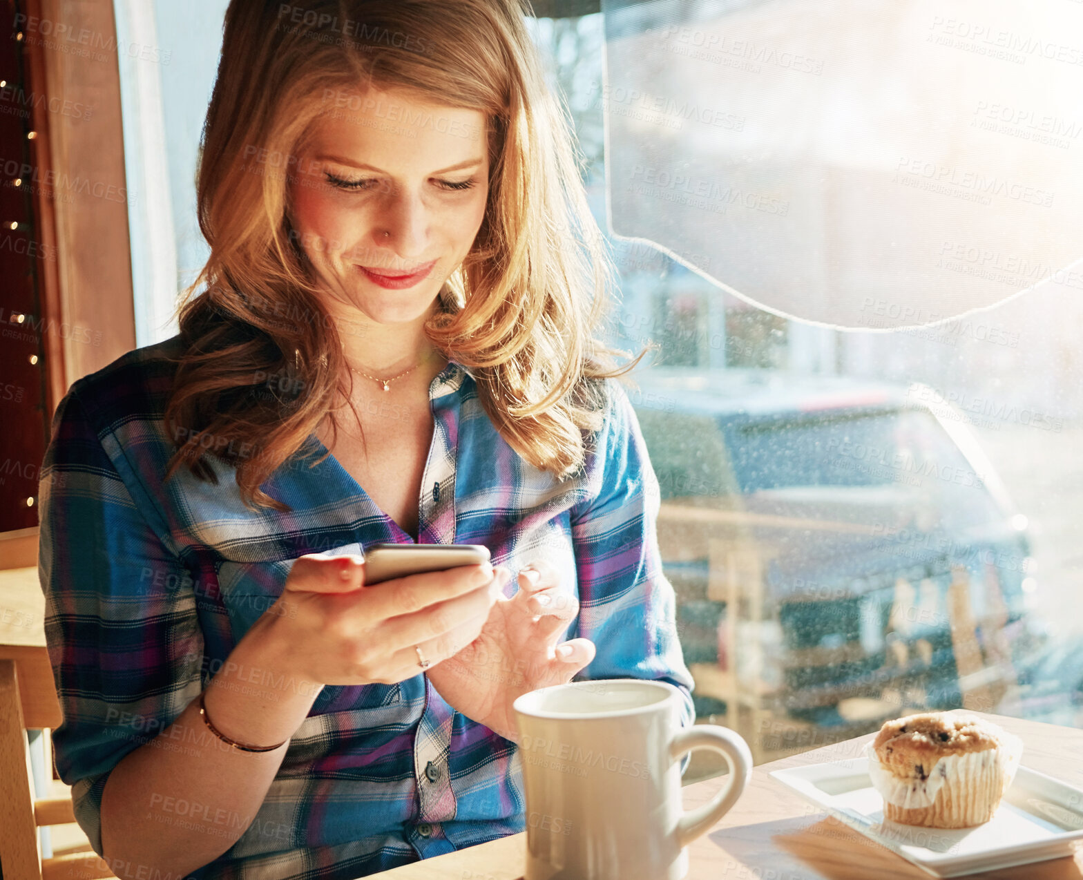 Buy stock photo Woman, smartphone and coffee in cafe for breakfast, app and digital menu with happiness in city. Girl, smile and muffin in Sweden at restaurant with phone for email, chat and online customer feedback