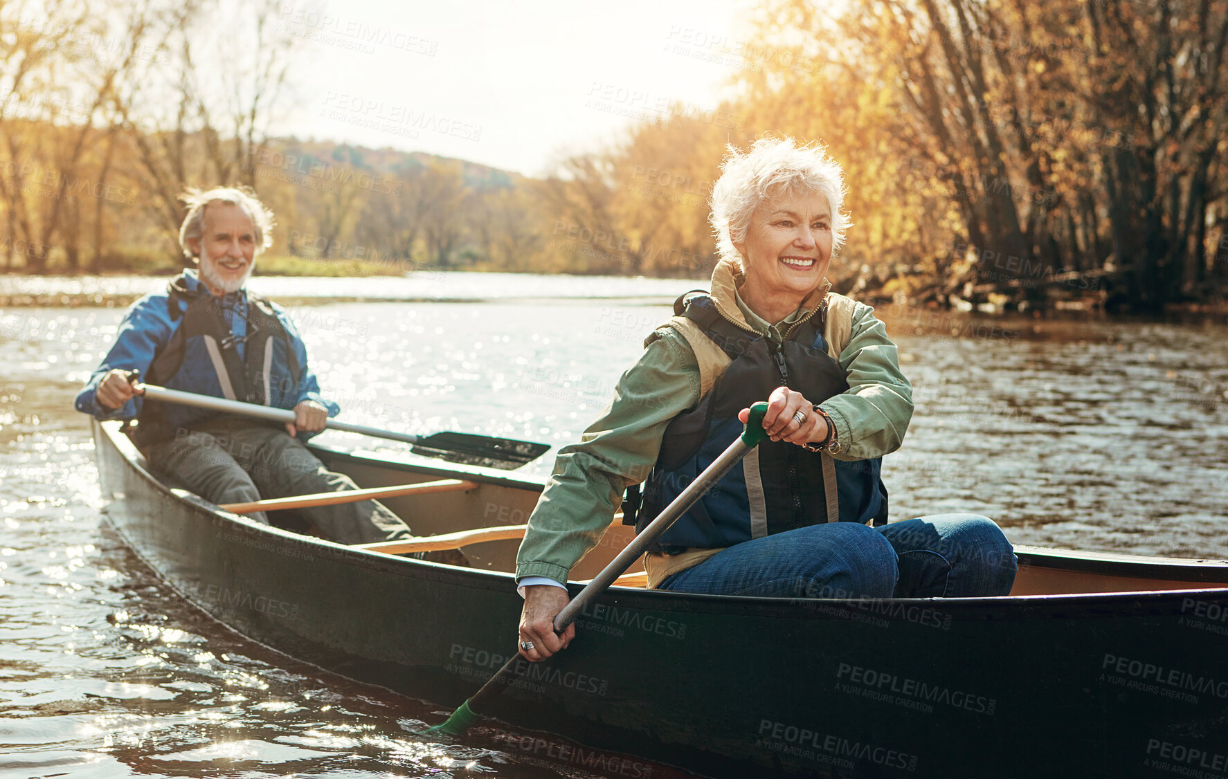 Buy stock photo Lake, relax and kayak with old couple, nature and retirement with happiness, weekend break and vacation. Outdoor, river or mature man with senior woman, support or rowing with holiday or getaway trip