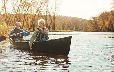 Buy stock photo Lake, senior couple and rowing in nature with canoe for explore, adventure or retirement activity. Outdoor, river and elderly woman with man on boat for kayaking, holiday or weekend break in Sydney