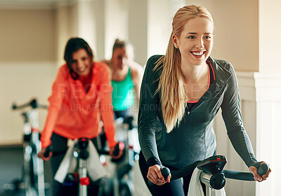 Buy stock photo Spinning class, gym and women riding exercise bikes for cardio workout and happiness. Friends, female people and health for training together or cycling performance for motivation, sport and support