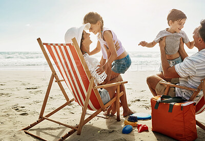 Buy stock photo Family, chairs and beach fun with happy people, children and parents together on vacation for bonding. Mother, father and love or relaxing on tropical holiday, wellness break and smile outside