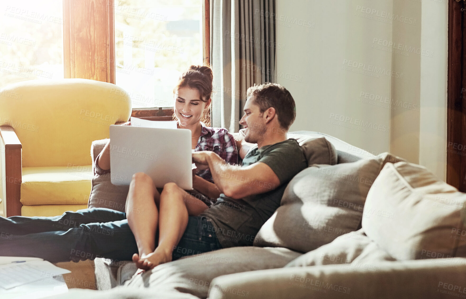 Buy stock photo Happy couple, laptop and talking on sofa for budget, planning and savings account for personal debt. Man, woman and together on couch with computer for expenses, tax and loan payment in living room