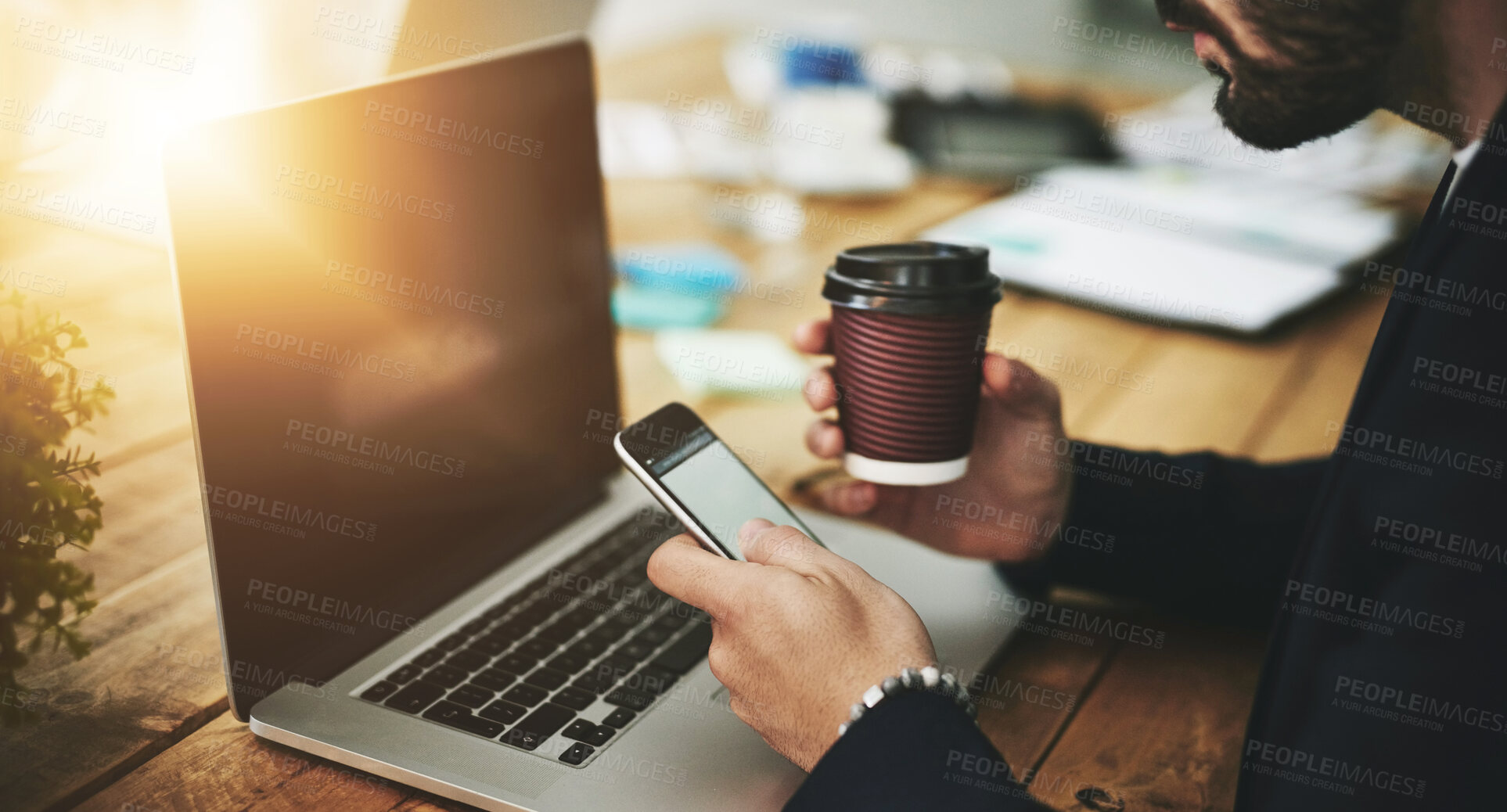 Buy stock photo Coffee, phone and laptop with man hands at coworking office with blank screen for social media break. Morning, web designer and creative job with latte and scroll at desk with design work and text