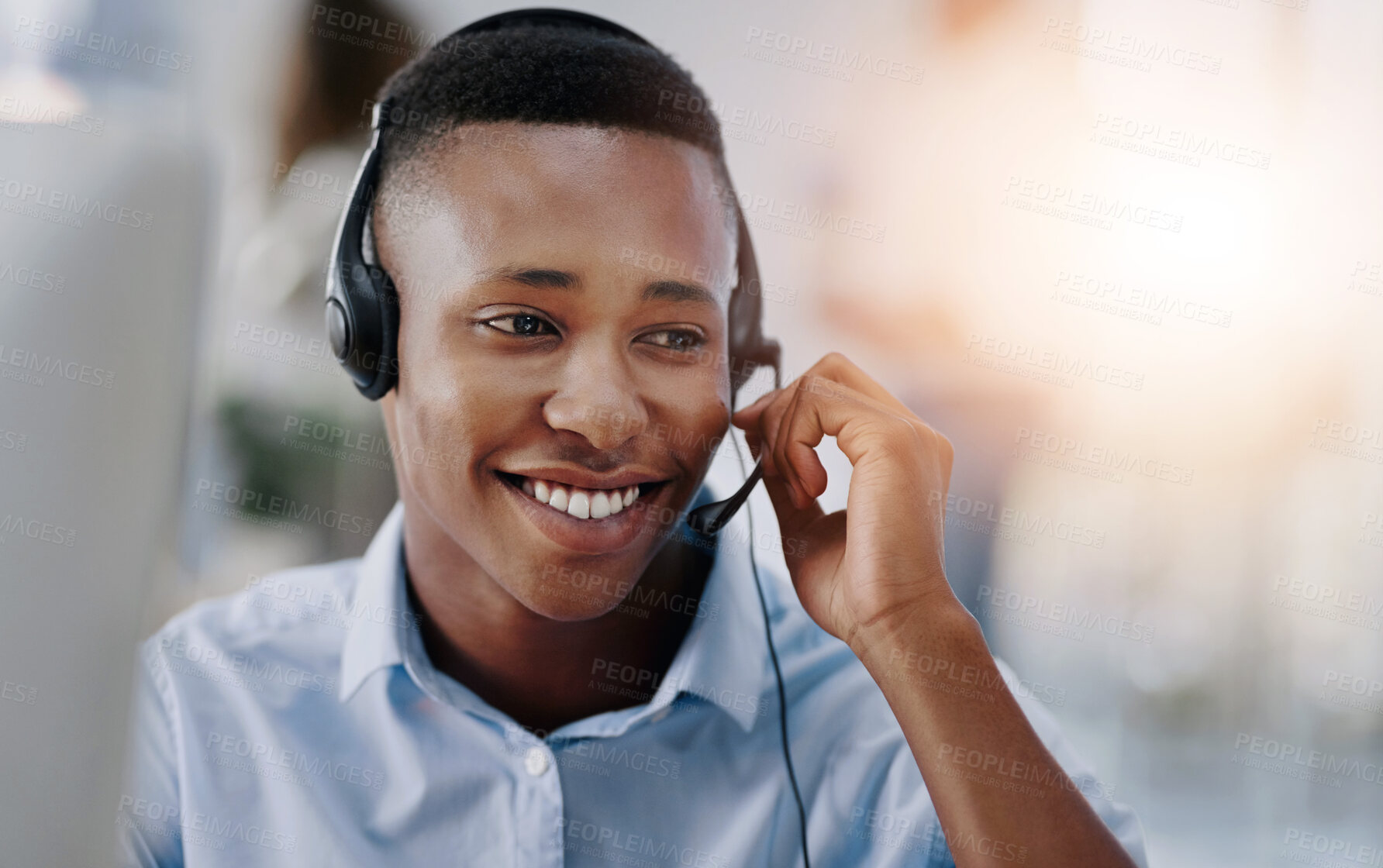 Buy stock photo Call center, headset and black man with smile, telemarketing and consultant in office and talking. Business, tech support and agent with conversation, help desk and communication for sales in startup