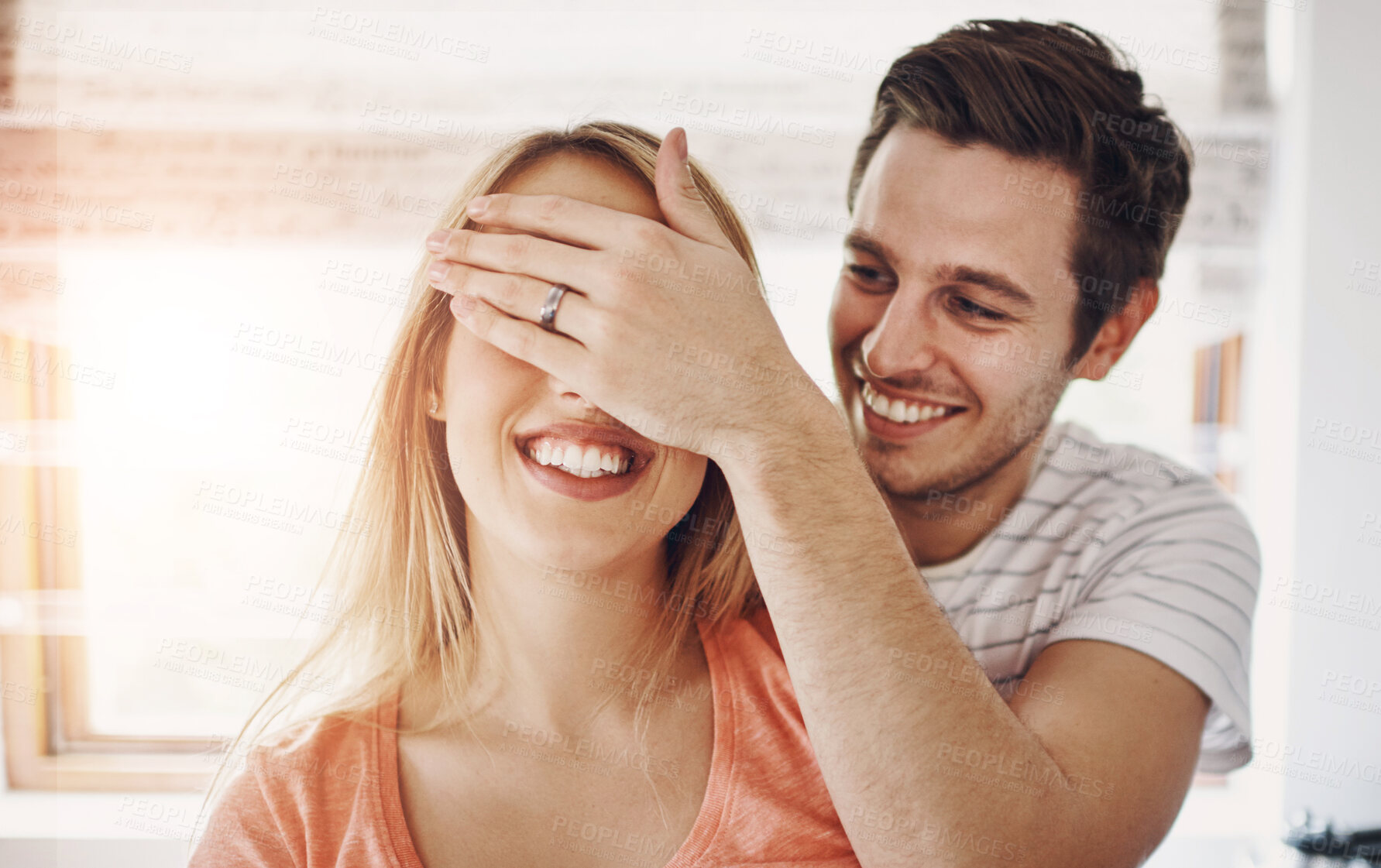 Buy stock photo Couple, hands and eyes closed for surprise in home, man and woman for support in marriage. Relationship, bonding and happy together for commitment, care and apartment for love with covered face