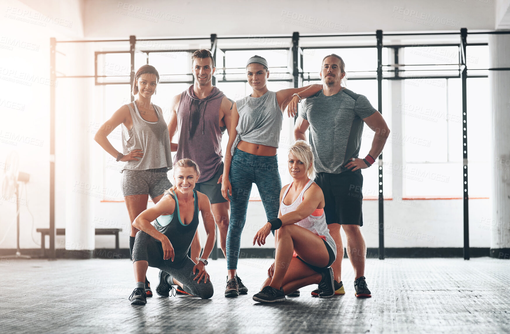 Buy stock photo Fitness class, portrait and group of people in gym for health, wellness and body workout challenge. Smile, friends and team of athletes with personal trainer for exercise together in sports center