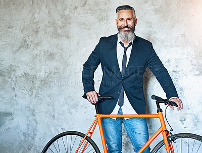 Buy stock photo Portrait, business and mature man with bike, travel and confident with wall background, startup and eco friendly. Person, entrepreneur and employee with bicycle, transportation and sustainability