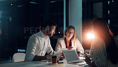 Buy stock photo Meeting, laptop and business people in office at night with stock market charts for corporate investment. Discussion, documents and financial advisors working on company profit report with deadline.