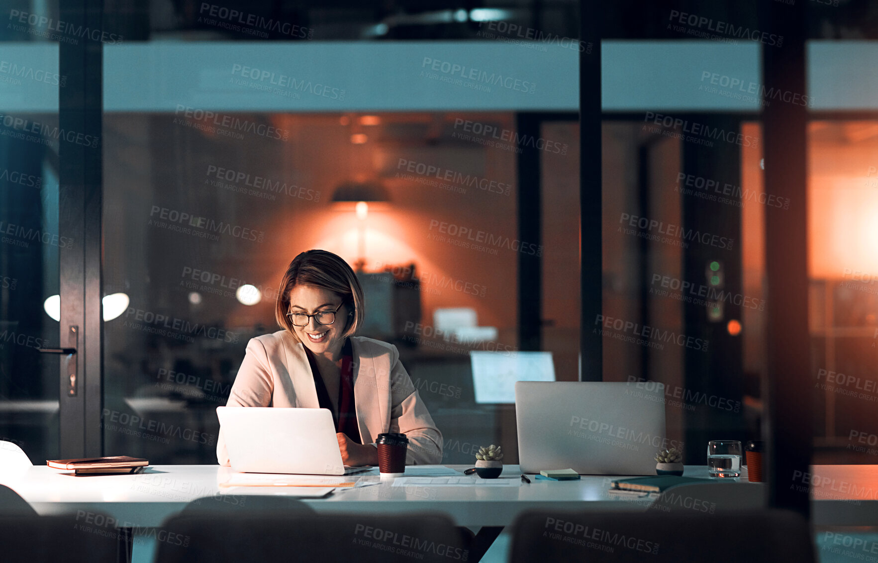 Buy stock photo Business woman, smile and laptop in office for corporate communication, internet research and networking. Female person, technology and coffee working late night for project planning and email