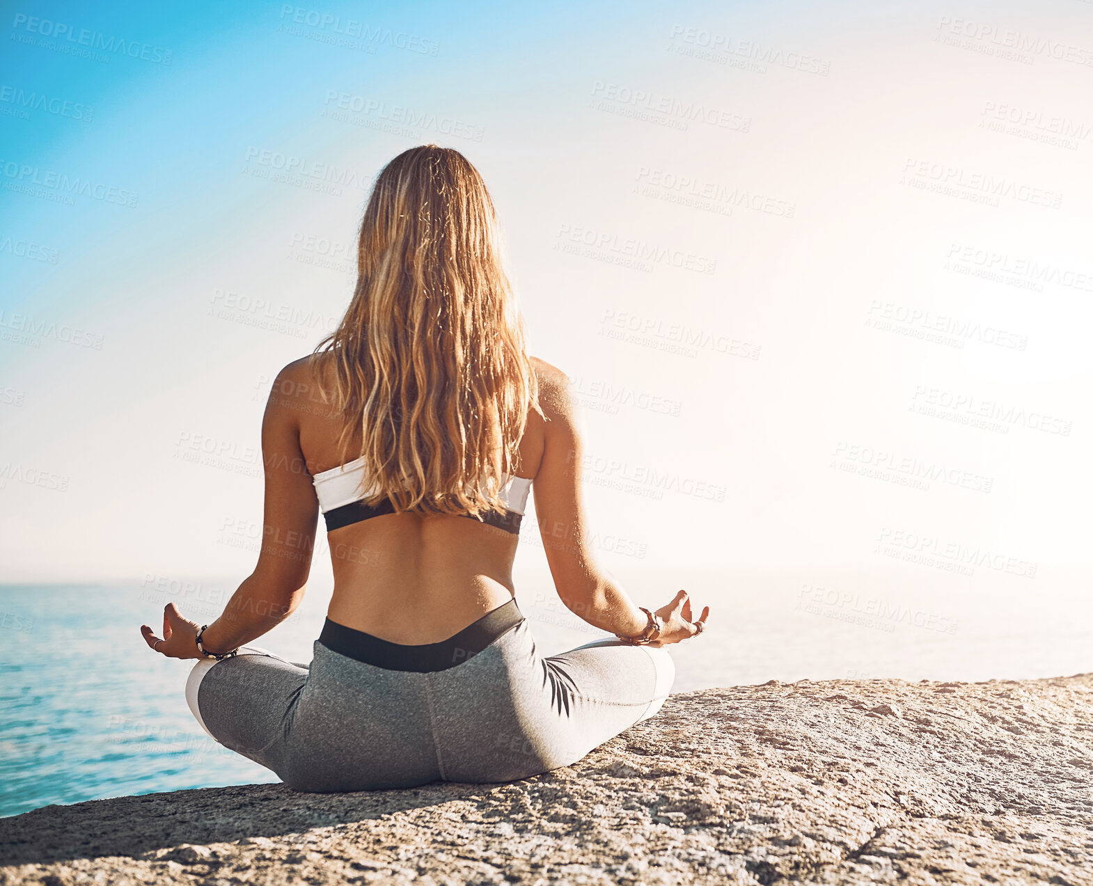 Buy stock photo Beach, meditation and woman back with lotus hands in nature for morning wellness, freedom or mental health at sunrise. Peace, zen or rear view of girl person at sea for holistic, healing or self care