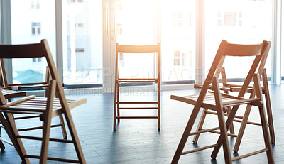 Buy stock photo Group, therapy and circle of chairs in empty room for counseling, rehabilitation or AA meeting. Psychology support, furniture and community centre for consultation, mental health or team building