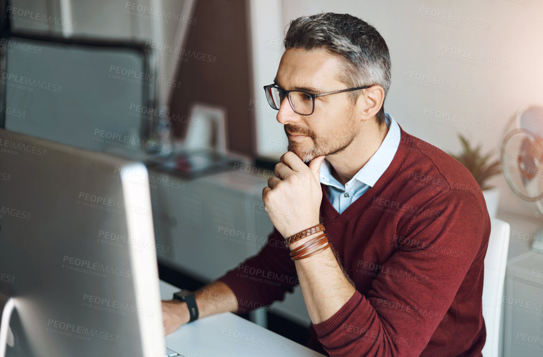 Buy stock photo Remote work, man and computer with glasses for thinking, response and research in home office. Male freelancer, technology and idea at desk for communication, review and planning on internet