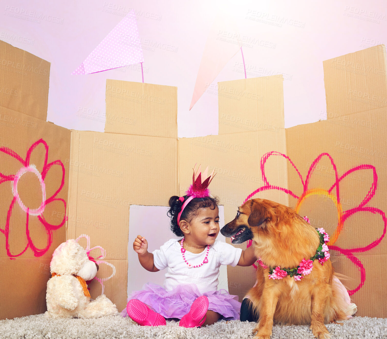 Buy stock photo Happy, little girl and princess with dog in castle for make belief, imagination or fairy tale dream at home. Child, toddler or baby playing with pet for game, fantasy or cosplay in costume at house