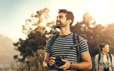 Buy stock photo Outdoor, nature and man with camera, adventure and thinking with sunshine, freedom and memory. People in forest, woman and guy with journey, photography and getaway trip with research and equipment